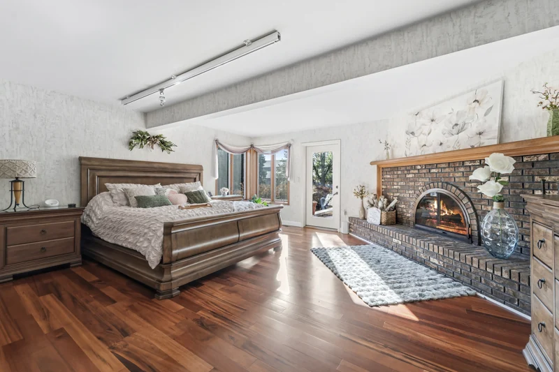 Primary bedroom and fireplace